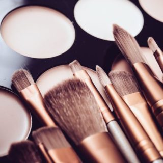 What are the must-have tools for a flawless makeup application