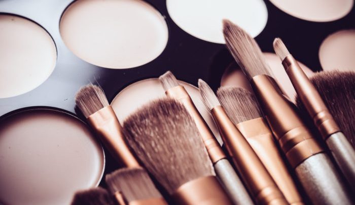 What are the must-have tools for a flawless makeup application