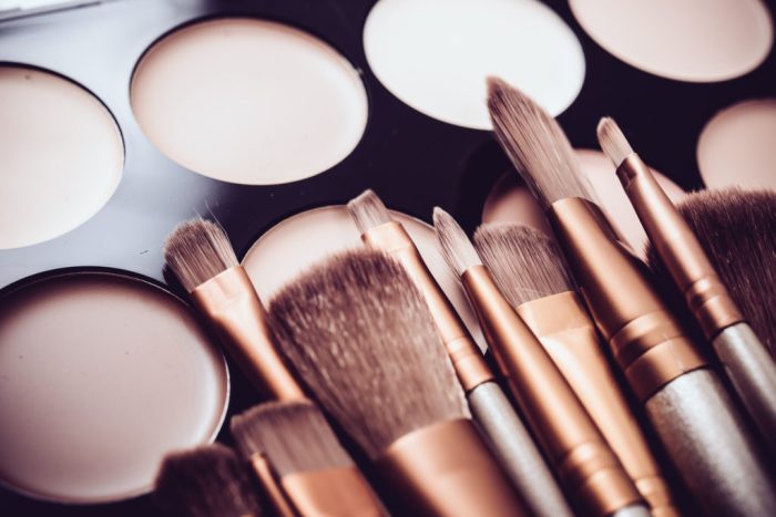 What are the must-have tools for a flawless makeup application